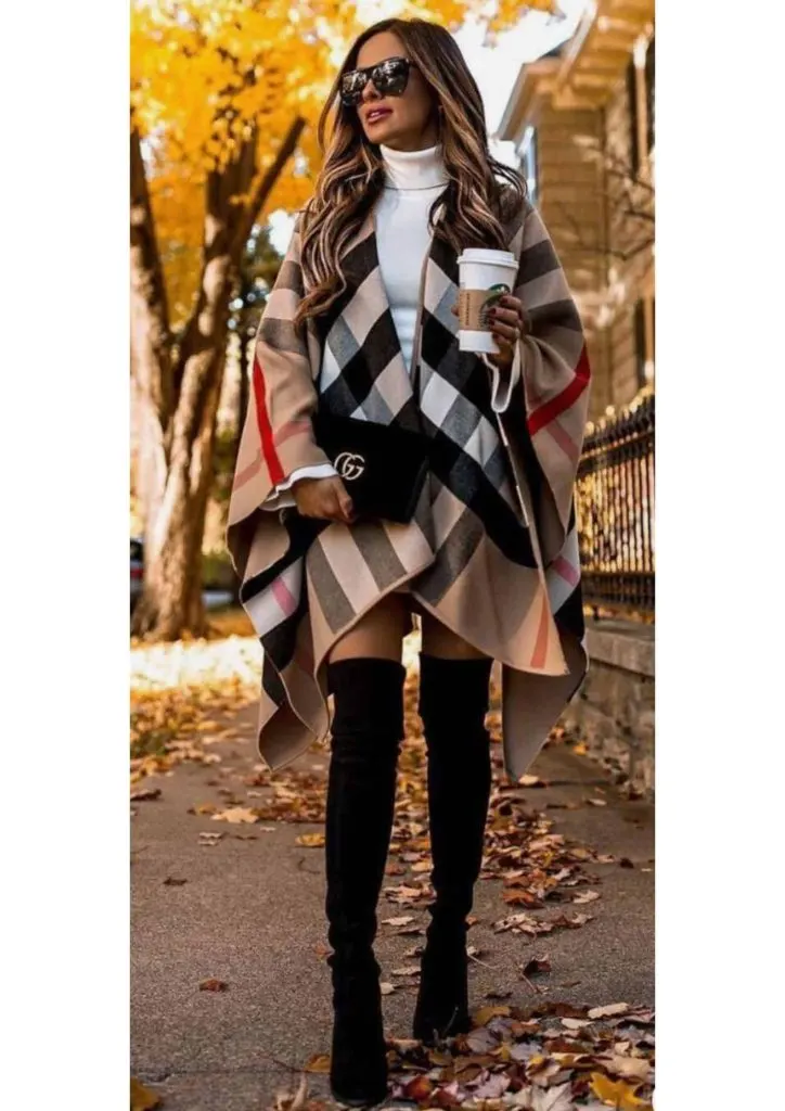 poncho and over knee boots
